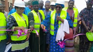 Ahmadu cutting the ribbon at the event