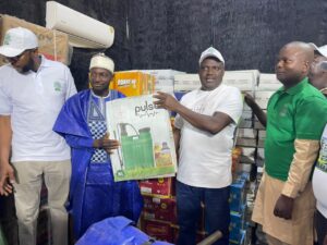 Maikalangu presenting equipments to beneficiaries