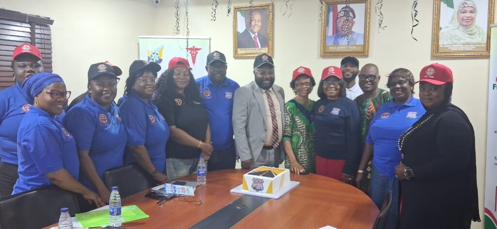 Ahmadu with the desk officers