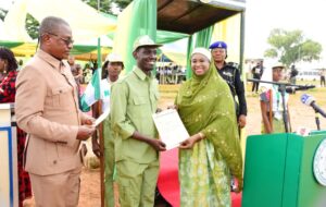 Dr Mahmoud with an outgoing corp member