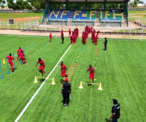 footballers on a sports facility