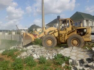 catapillar taking down buildings in Riverpark
