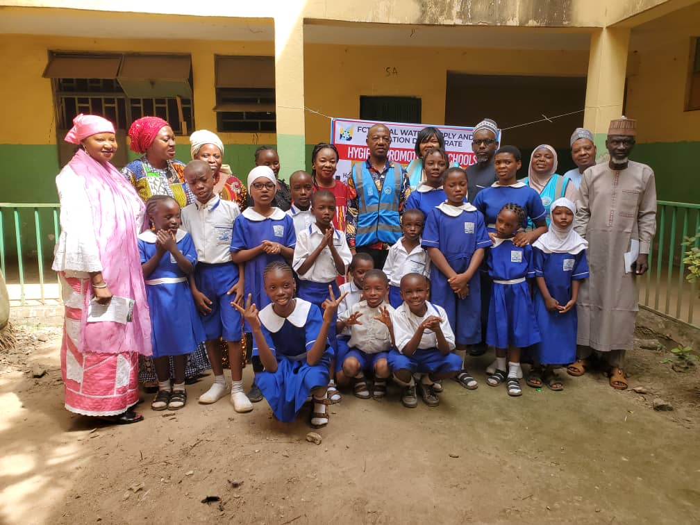 FCT RUWASSA team with teachers and pupils from the school