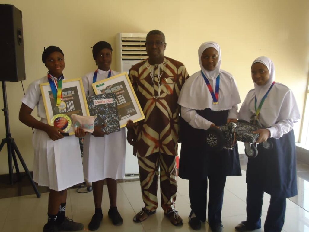 The winning team with the Director, DSTI