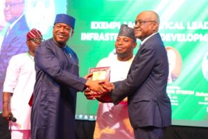 Barr Wike recieving a recognition award during the event