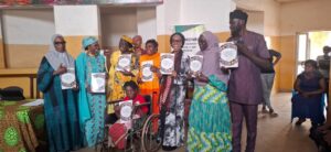 Dr Benjamins-Laniyi, with Prof. Ibrahim and others during the presensation of teh books to the children