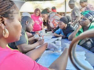 FCTA officials administring medicines to some beneficiaries in Zuba Market