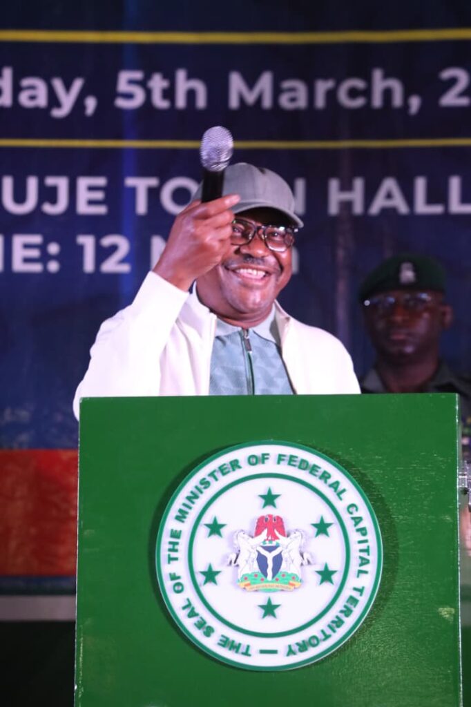 Barr Wike interacting with residents of Kuje during his visit