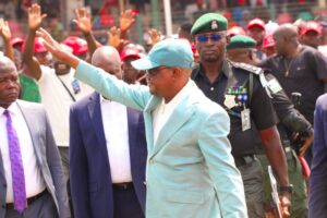 Wike waving at the people during his Thank You visit to Bwari