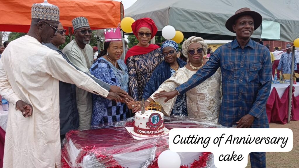 GSS Bwari Administrators cutting the anniversary cake
