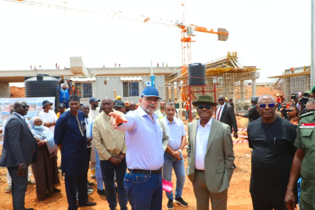 Wike with officials of the fcta and contractors during inspection of the kuje town road
