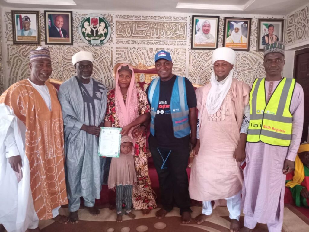 one of the beneficiaries with the traditional rulers in Bwari