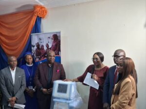 Fasawe recieving the machine