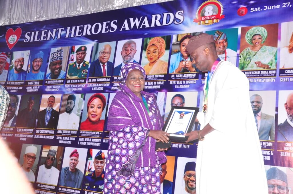director recieving her award