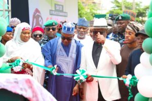 Tajudeen, Wike and Mahmoud during the commissioning of Gbazango road